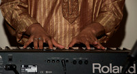 Partha Gupta plays keyboards.